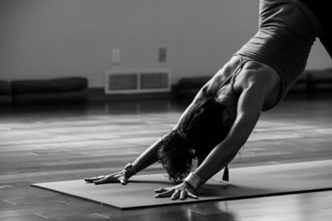 A woman performs a yoga pose
